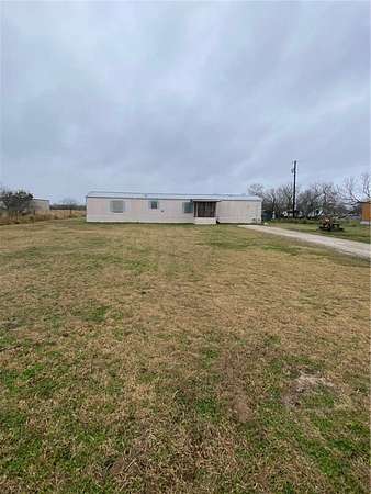 1.5 Acres of Residential Land with Home for Sale in Woodsboro, Texas