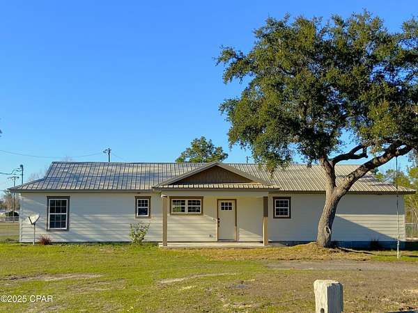 1.64 Acres of Residential Land with Home for Sale in Youngstown, Florida