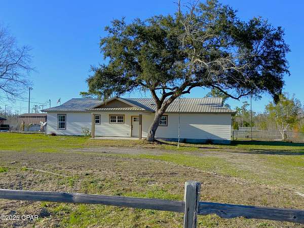 1.64 Acres of Residential Land with Home for Sale in Youngstown, Florida