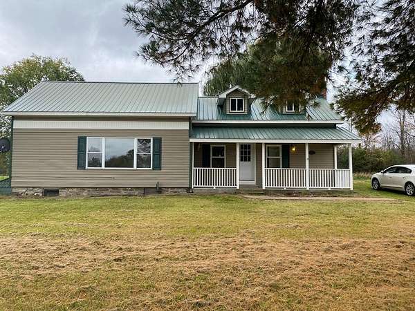 1.5 Acres of Land with Home for Sale in Brasher Falls, New York