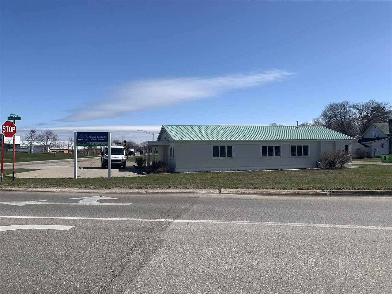 1.5 Acres of Improved Commercial Land for Sale in Charlevoix, Michigan