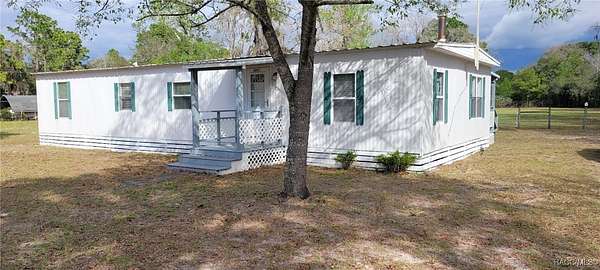 1.89 Acres of Residential Land with Home for Sale in Homosassa, Florida