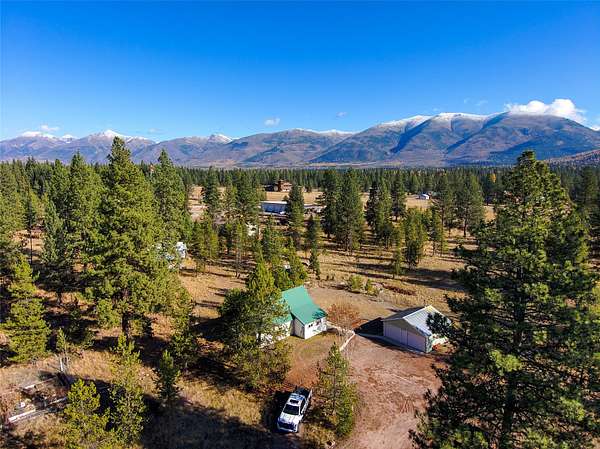 1.69 Acres of Residential Land with Home for Sale in Seeley Lake, Montana