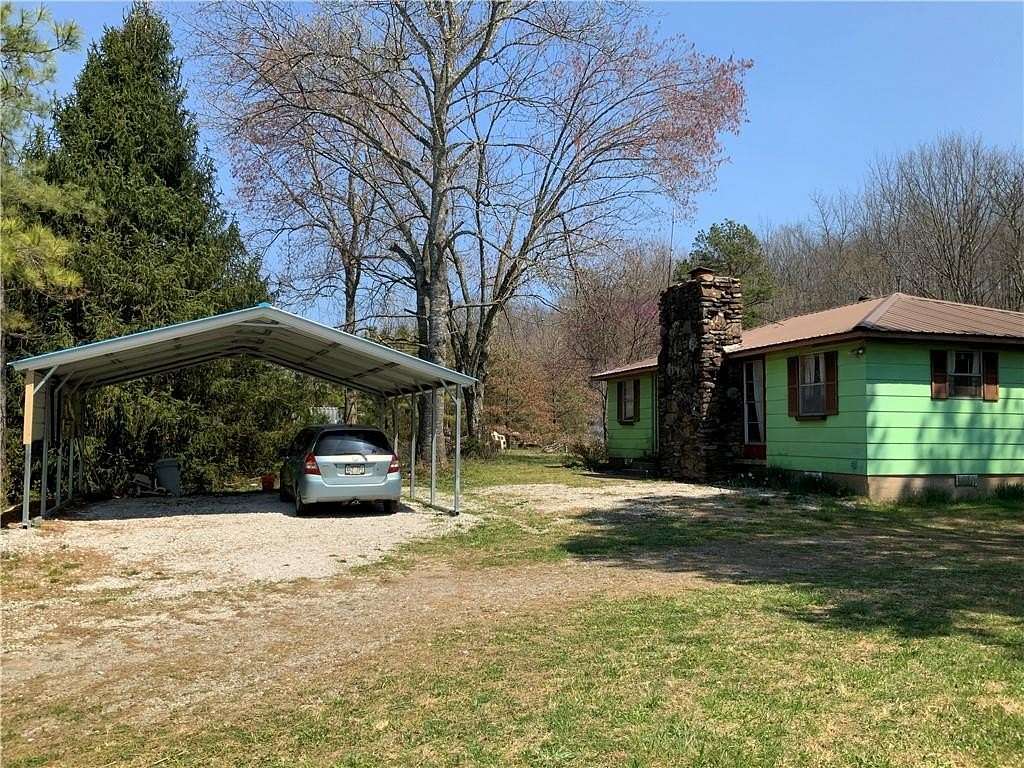 1.5 Acres of Residential Land with Home for Sale in Pettigrew, Arkansas