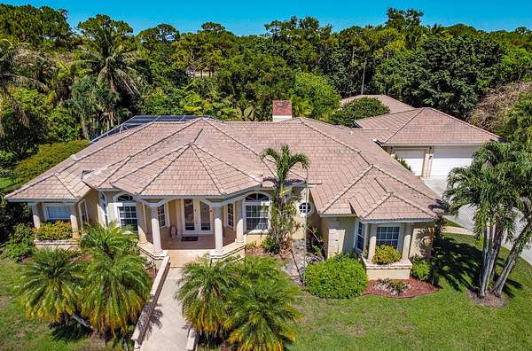 1.85 Acres of Residential Land with Home for Sale in Palm Beach Gardens, Florida