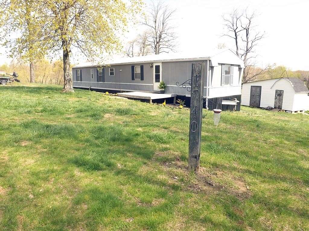 1.5 Acres of Residential Land with Home for Sale in Nebo, Kentucky