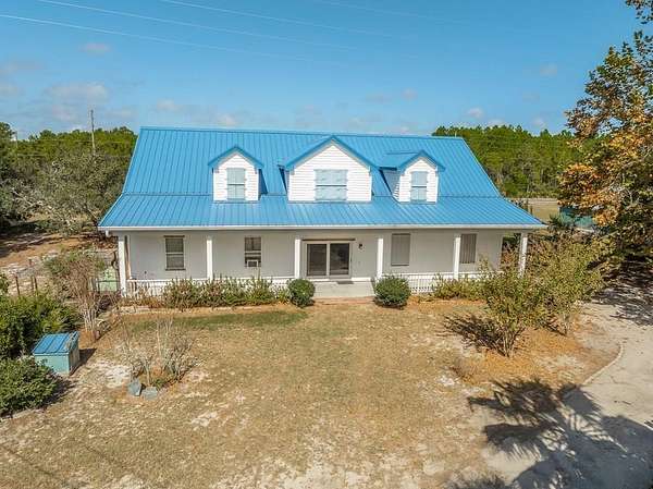 1.56 Acres of Residential Land with Home for Sale in Eastpoint, Florida