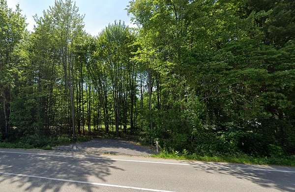 1.64 Acres of Residential Land with Home for Sale in Spring Lake, Michigan