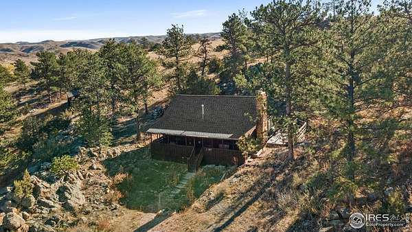 35.1 Acres of Recreational Land with Home for Sale in Livermore, Colorado