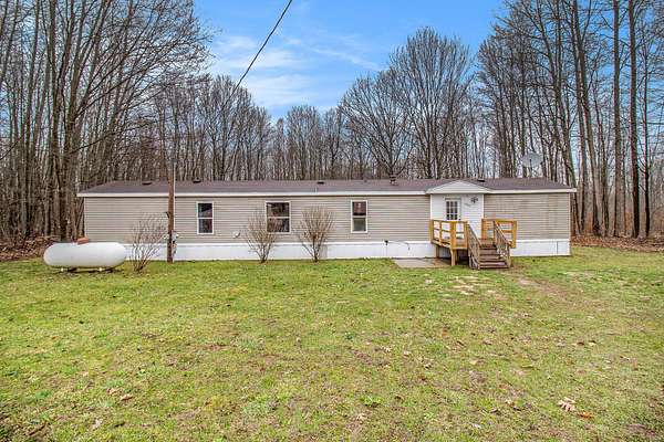 5 Acres of Residential Land with Home for Sale in Hesperia, Michigan