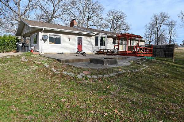 1.65 Acres of Residential Land with Home for Sale in El Dorado Springs, Missouri