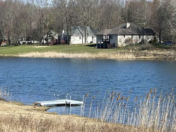 0.48 Acres of Residential Land for Sale in Canadian Lakes, Michigan