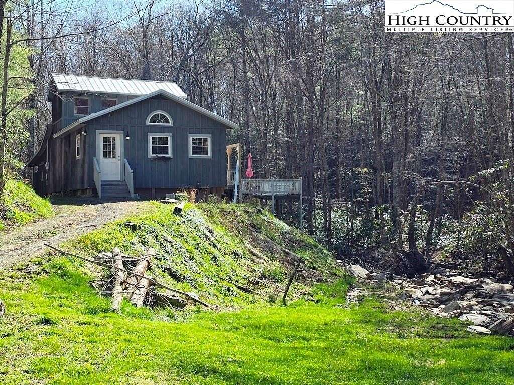 176 Acres of Recreational Land with Home for Sale in Lansing, North Carolina