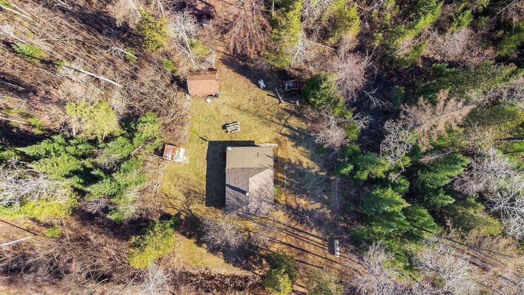 100 Acres of Recreational Land with Home for Sale in Alger, Michigan