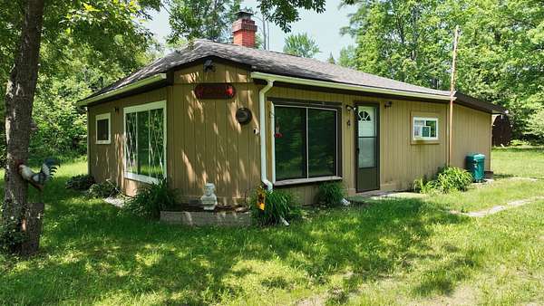 100 Acres of Recreational Land with Home for Sale in Alger, Michigan