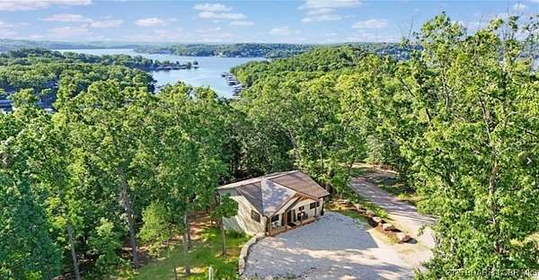 8 Acres of Residential Land with Home for Sale in Sunrise Beach, Missouri