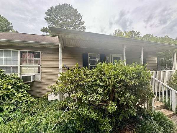 7.1 Acres of Residential Land with Home for Sale in Fayetteville, Georgia