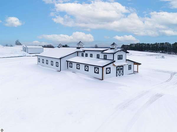 5 Acres of Land with Home for Sale in Williamsburg, Michigan