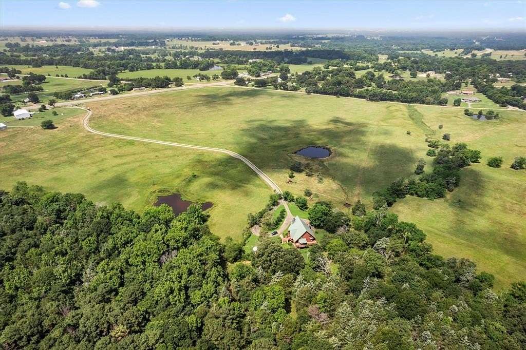 2 Acres of Residential Land with Home for Sale in Mount Pleasant, Texas