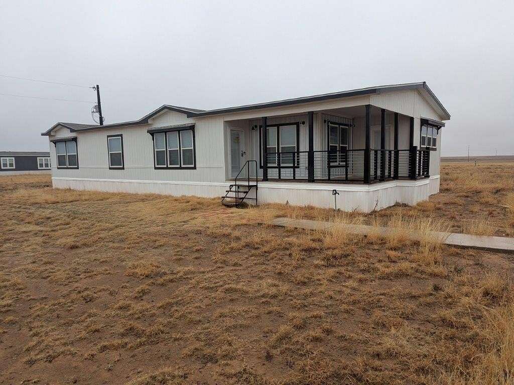 5 Acres of Residential Land with Home for Sale in Abernathy, Texas