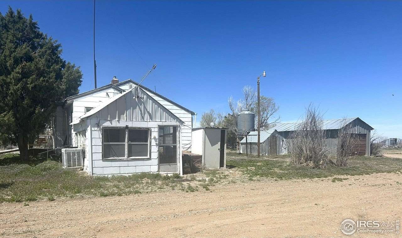 5 Acres of Residential Land with Home for Sale in Woodrow, Colorado