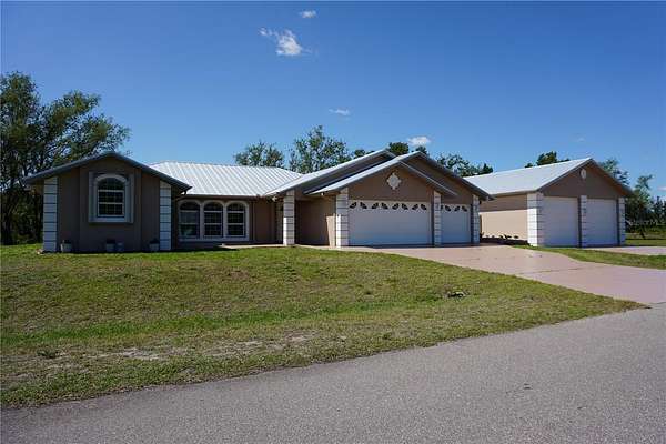 1.75 Acres of Residential Land with Home for Sale in Punta Gorda, Florida