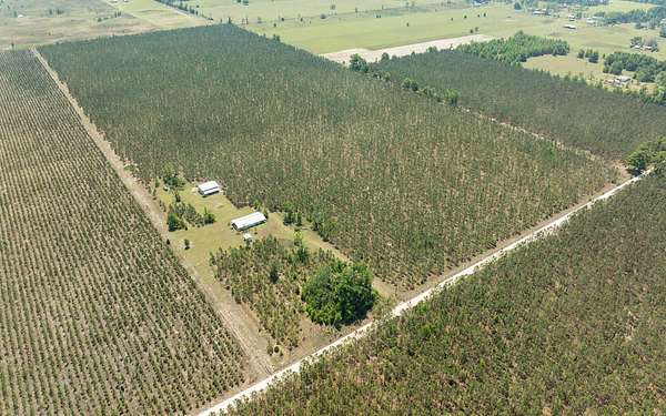 70 Acres of Recreational Land with Home for Sale in Live Oak, Florida