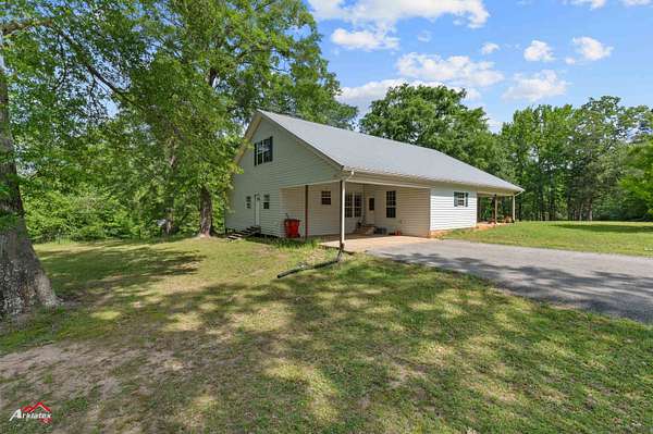 6.12 Acres of Land with Home for Sale in Henderson, Texas