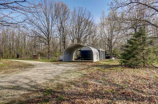 13.8 Acres of Land with Home for Sale in Fair Grove, Missouri