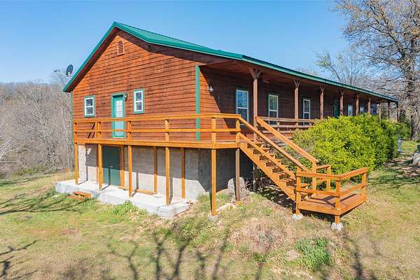 18.7 Acres of Land with Home for Sale in Seligman, Missouri