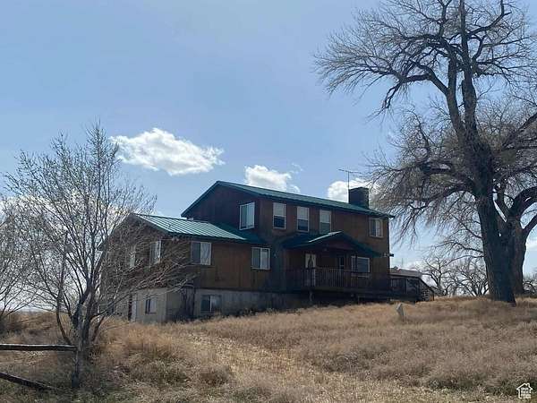 5 Acres of Residential Land with Home for Sale in Myton, Utah