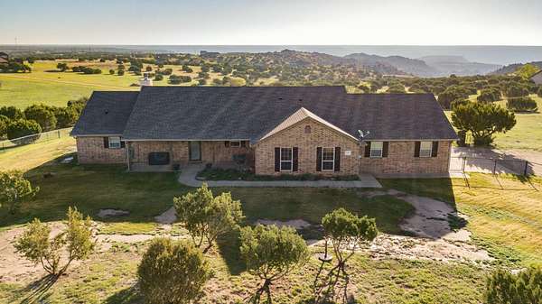 5.4 Acres of Residential Land with Home for Sale in Canyon, Texas