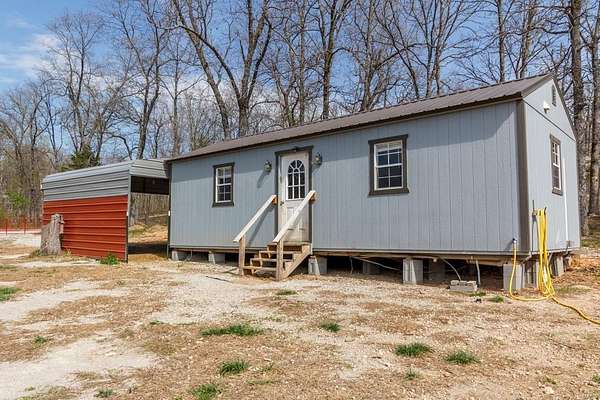 5 Acres of Land with Home for Sale in Lebanon, Missouri