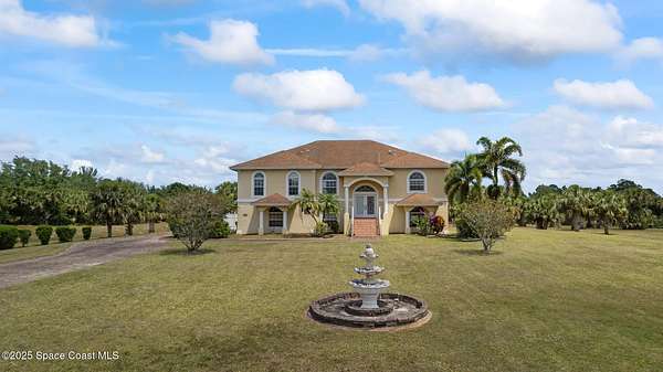 3.32 Acres of Residential Land with Home for Sale in Palm Bay, Florida