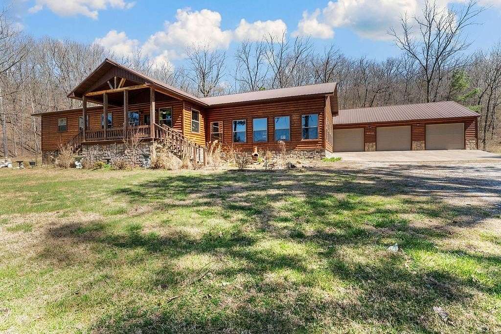 10.8 Acres of Land with Home for Sale in Combs, Arkansas