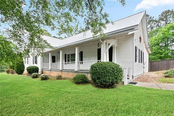 5.25 Acres of Land with Home for Sale in Powder Springs, Georgia