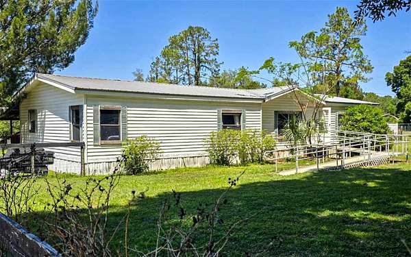 3 Acres of Residential Land with Home for Sale in Reddick, Florida