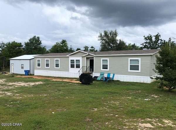 10 Acres of Residential Land with Home for Sale in Fountain, Florida