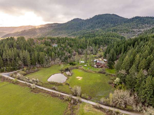 23 Acres of Improved Land for Sale in Cave Junction, Oregon
