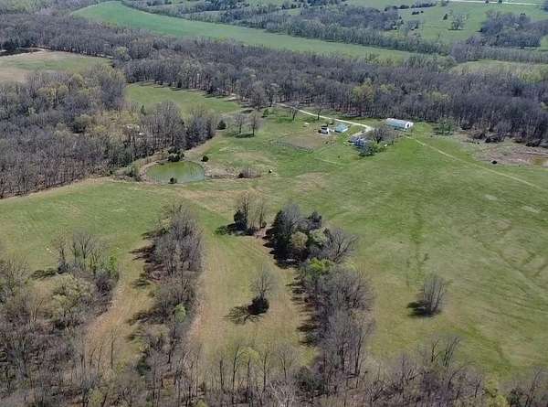 250 Acres of Land with Home for Sale in Collins, Missouri