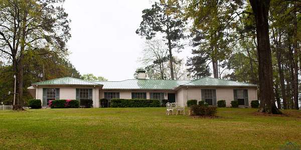 1.59 Acres of Residential Land with Home for Sale in Queen City, Texas
