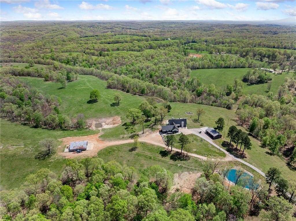 54 Acres of Land with Home for Sale in Harrison, Arkansas