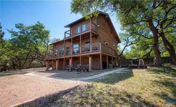 2 Acres of Residential Land with Home for Sale in Canyon Lake, Texas