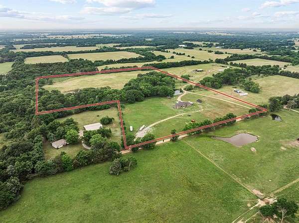 24.2 Acres of Land with Home for Sale in Ravenna, Texas