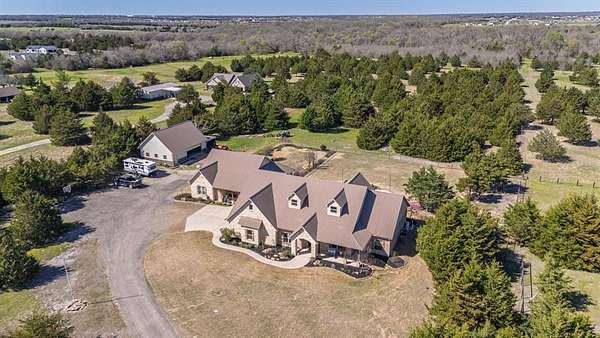 10 Acres of Residential Land with Home for Sale in Caddo Mills, Texas