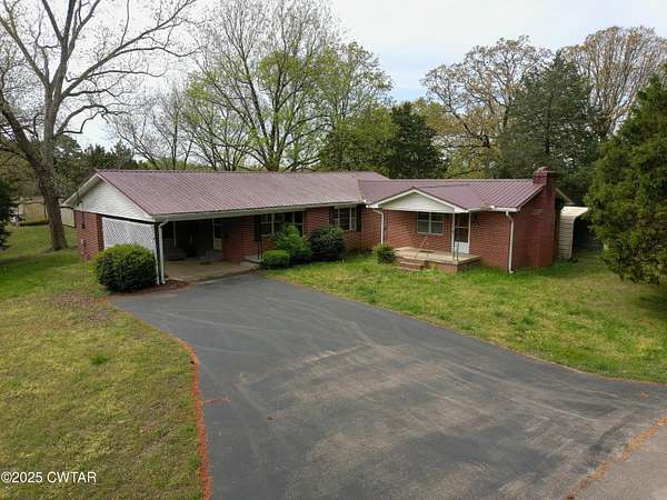 26.5 Acres of Agricultural Land with Home for Sale in Henderson, Tennessee