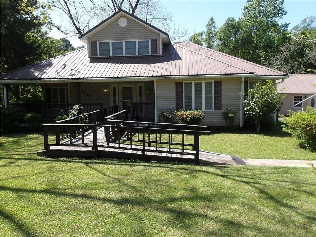 5.7 Acres of Residential Land with Home for Sale in Grand Bay, Alabama