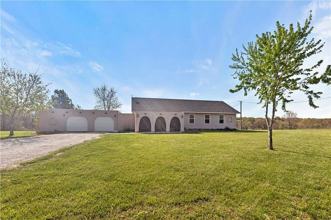 10.3 Acres of Land with Home for Sale in Green Forest, Arkansas