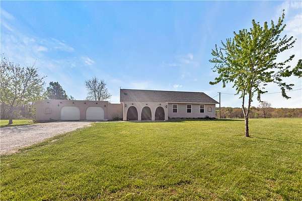 10.3 Acres of Land with Home for Sale in Green Forest, Arkansas