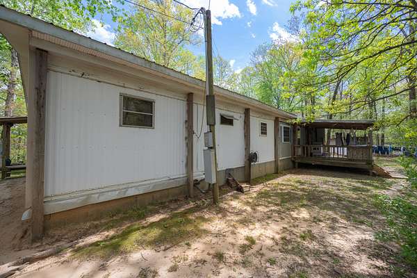 35.6 Acres of Land with Home for Sale in Yuma, Tennessee